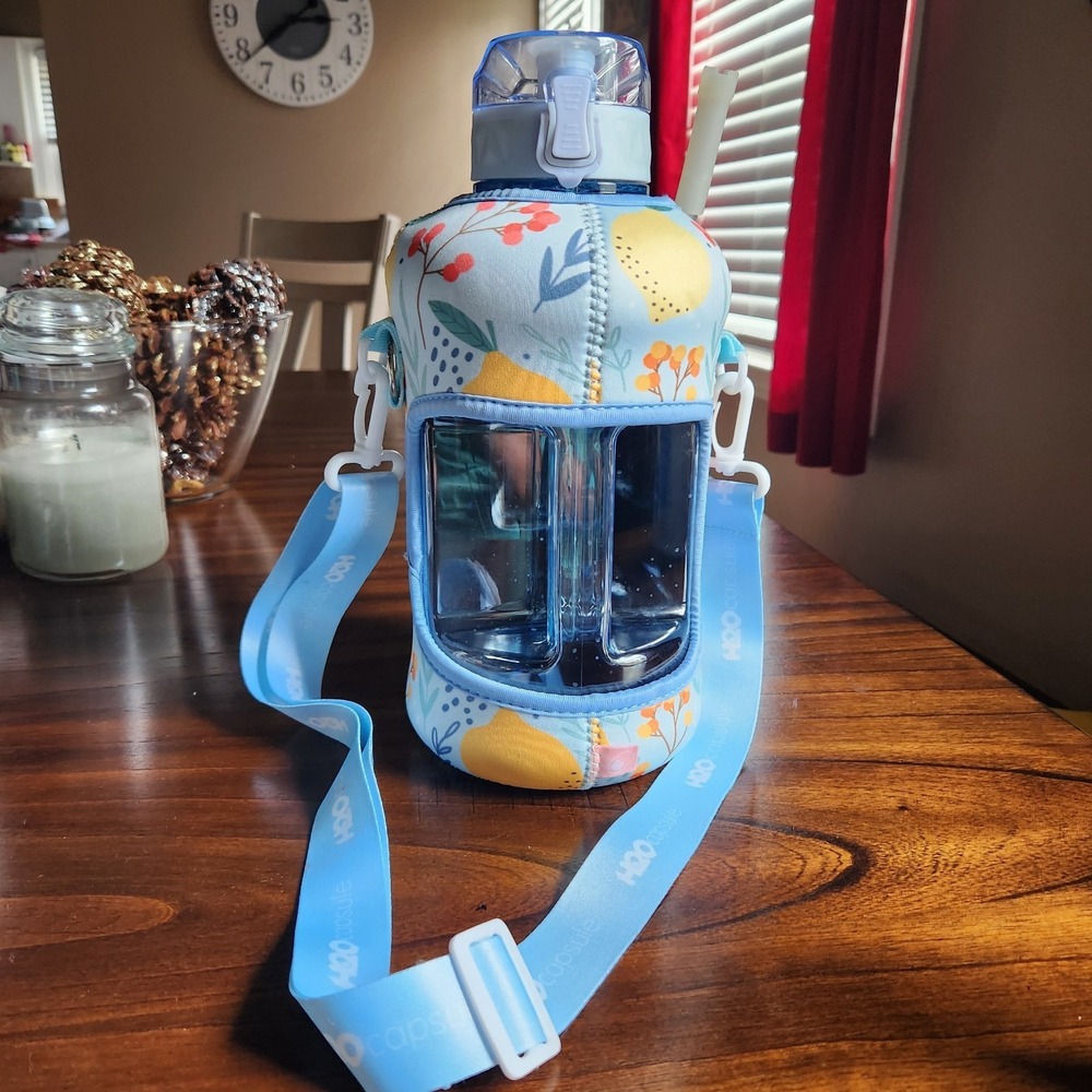 H2O CAPSULE 1/2 GALLON WATER BOTTLE & STORAGE CARRY SLEEVE. Covered Straw